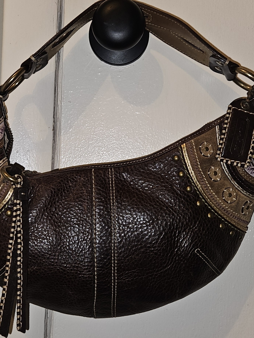 Coach Brown Leather Hobo Bag with Stud and Tassel Detail